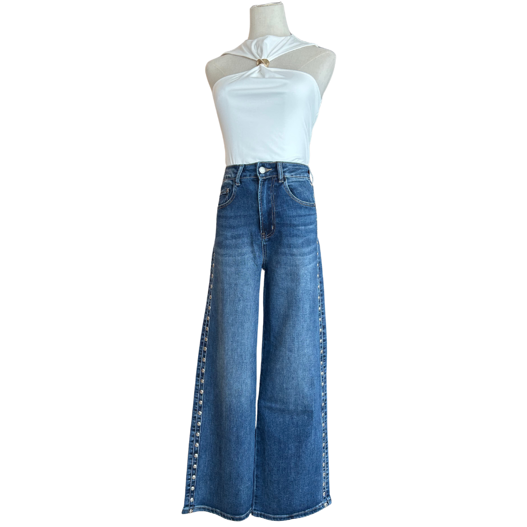 PANTALÓN DE MEZCLILLA CON ESTOPEROLES