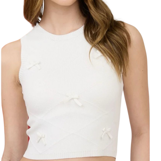 BLUSA BLANCA DE PUNTO SIN MANGAS CON MOÑITOS