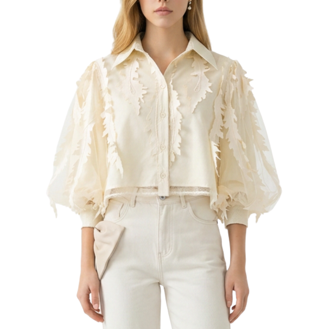 CAMISA CON APLICACIONES DE HOJAS BEIGE